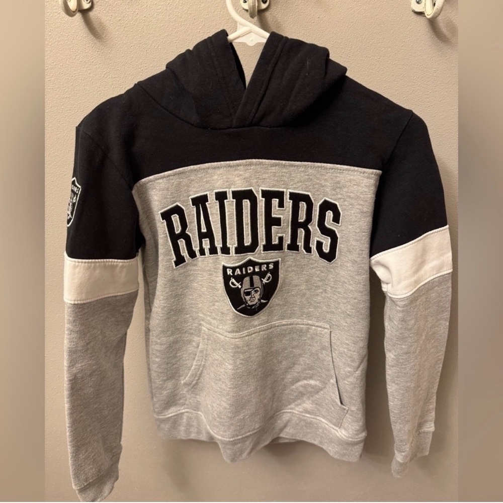 Raiders Black and Gray Sweater. Youth size XL.